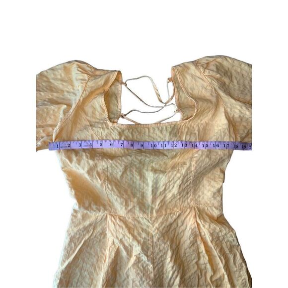 ASOS Yellow Seersucker Puff Sleeve Lace Up Back Romper - Picture 11 of 12